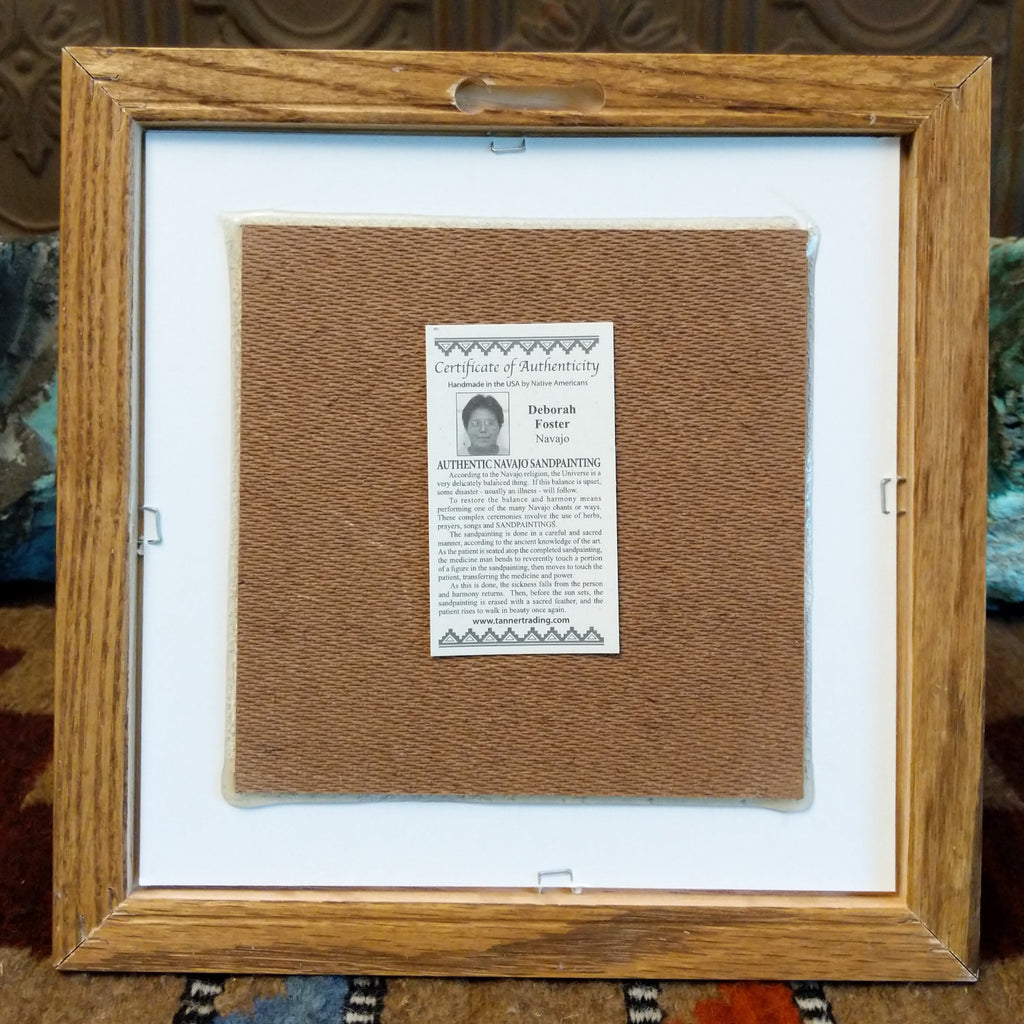 The back features the authentication tag and wooden frame.
