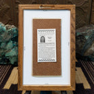 Backside of the Yei sand painting, showing the Certificate of Authenticity and Artist information. 