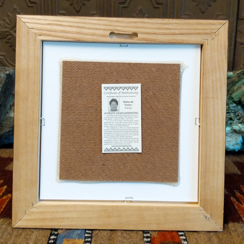 The back features a place to hang the picture and the authentication tag.