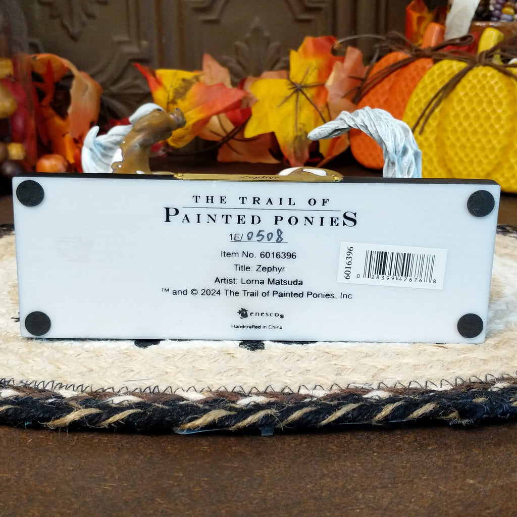 Information about the sculpture are found on the underside of the base.