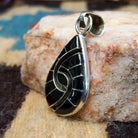 Sterling silver pendant with black onyx inlaid in the spiral of the teardrop setting.
