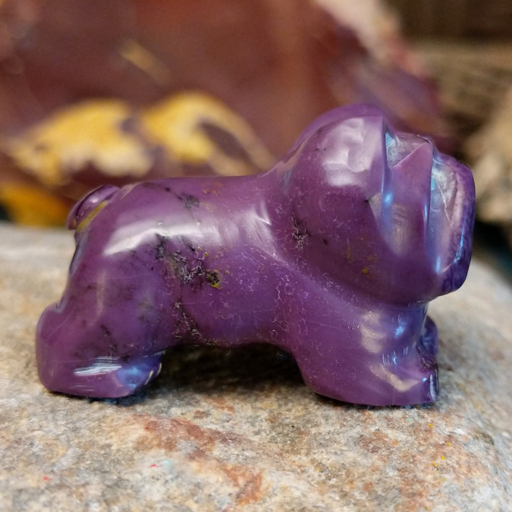 Purple lavulite carved into a french bulldog.