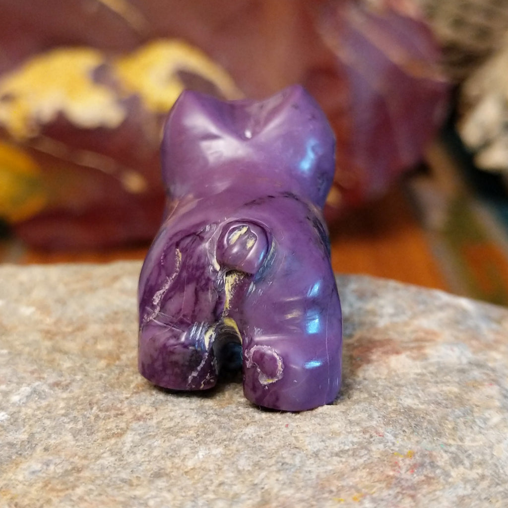 Purple lavulite carved into a french bulldog.