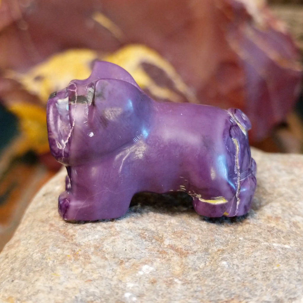 Purple lavulite carved into a french bulldog.