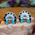 Sterling silver Zuni cuff links with sunface-inspired multistone inlay design.