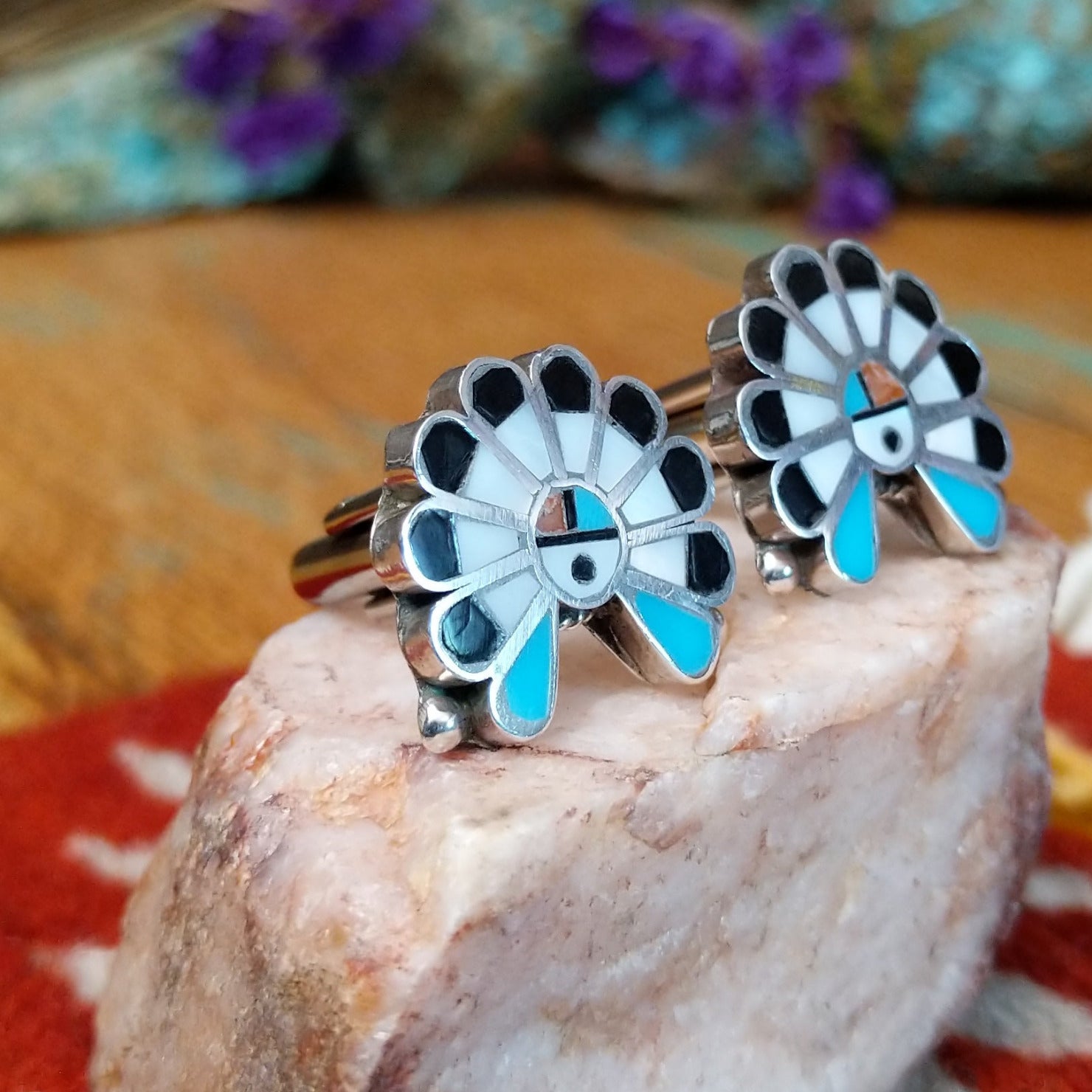 Sterling silver Zuni cuff links with sunface-inspired multistone inlay design.