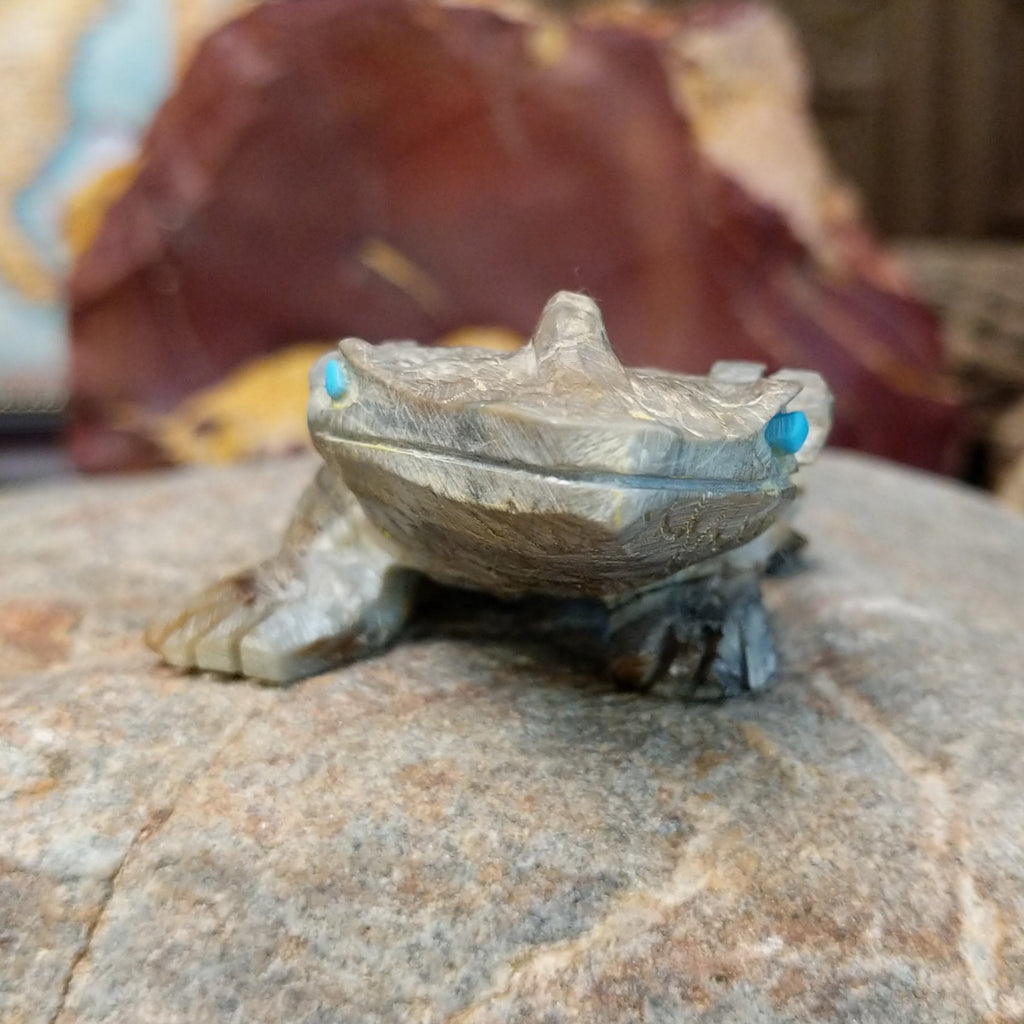 Horned toad fetish carved from picasso marble with intricately etched incisions and details.