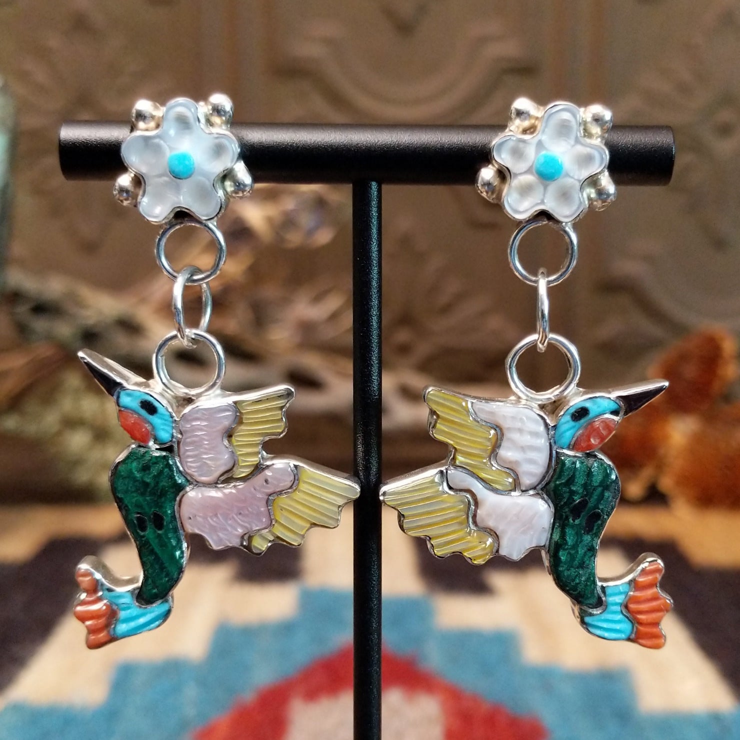 Sterling silver hummingbird earrings with multistone inlay.