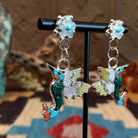 Sterling silver hummingbird earrings with multistone inlay.