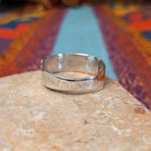 Zuni Inlay Ring by R. Sheyka with multistone geometric inlay and twisted silver borders.