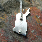 Handcrafted sterling silver Zuni Maiden pin and pendant by Andrea Shirley Lonjose, featuring intricate multistone inlay in a traditional Maiden design; artisan signature.