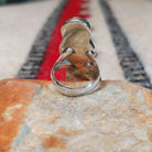 Zuni inlay maiden ring by Theresa Waseta with shell, turquoise, coral, and dark stone.