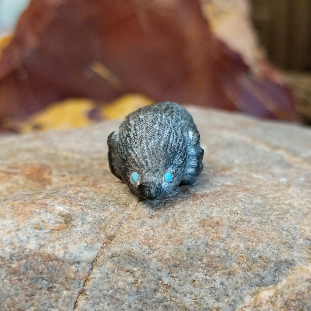 Black marble carved in the shape of a mole.