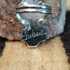 Close-up of the artisan's signature.