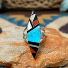 Handcrafted sterling silver Zuni multistone navette ring by Cleo Kallestewa, featuring a geometric inlay.