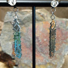 Handcrafted sterling silver Zuni turquoise and coral needlepoint earrings by Lamar Peywa, featuring elongated dangle inlay with coral stud tops; artisan and Sterling Silver stamp.