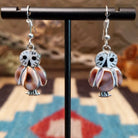 Sterling silver owl earrings with cowry shell, black onyx, and mother of pearl inlaid on the bezels.