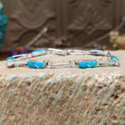 Sterling Silver link bracelet with turquoise stones 