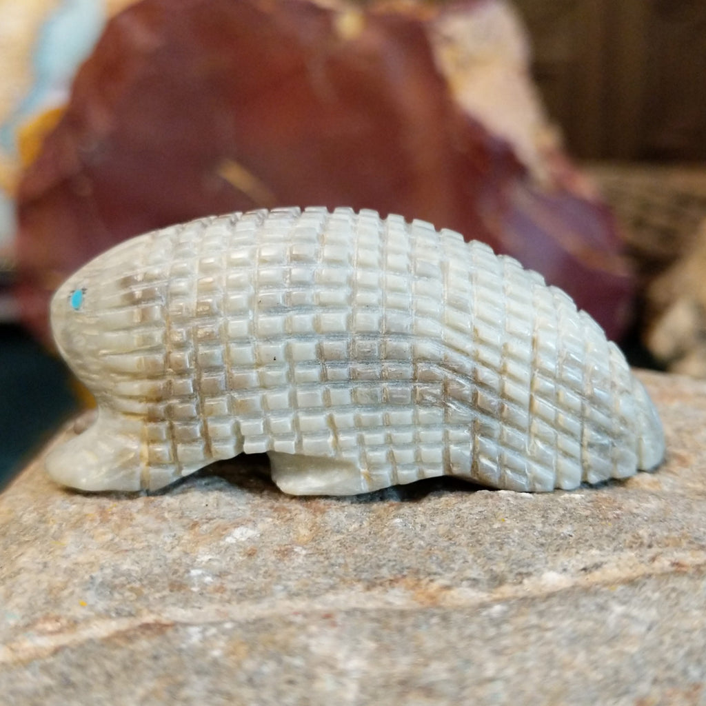 Picasso marble carved into a porcupine fetish with intricate etched details.