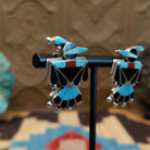 Sterling silver thunderbird earrings with multistone inlay.