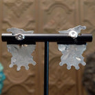 Close-up of artisan's etched signatures.