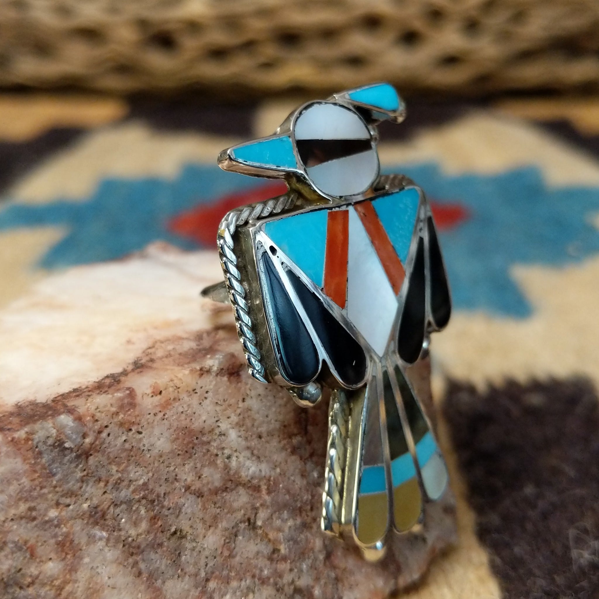 Zuni Thunderbird ring, featuring a handcrafted sterling silver Thunderbird design with intricate detailing and traditional Southwestern craftsmanship.  Side view.