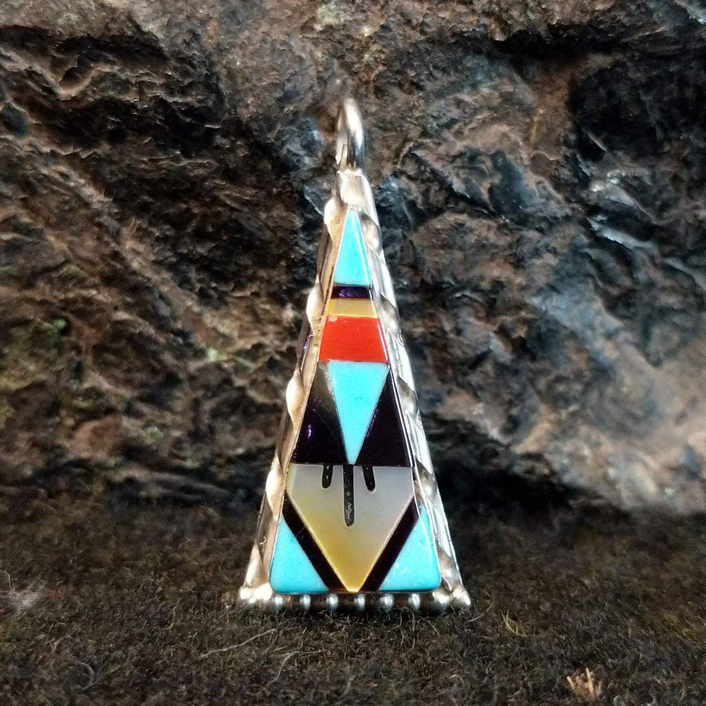 Various stones inlaid in a triangular sterling silver bezel.
