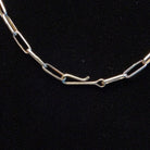 Close-up of the hook clasp on the necklace.