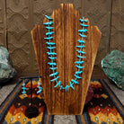 Zuni turquoise fetish necklace and matching dangle earrings.