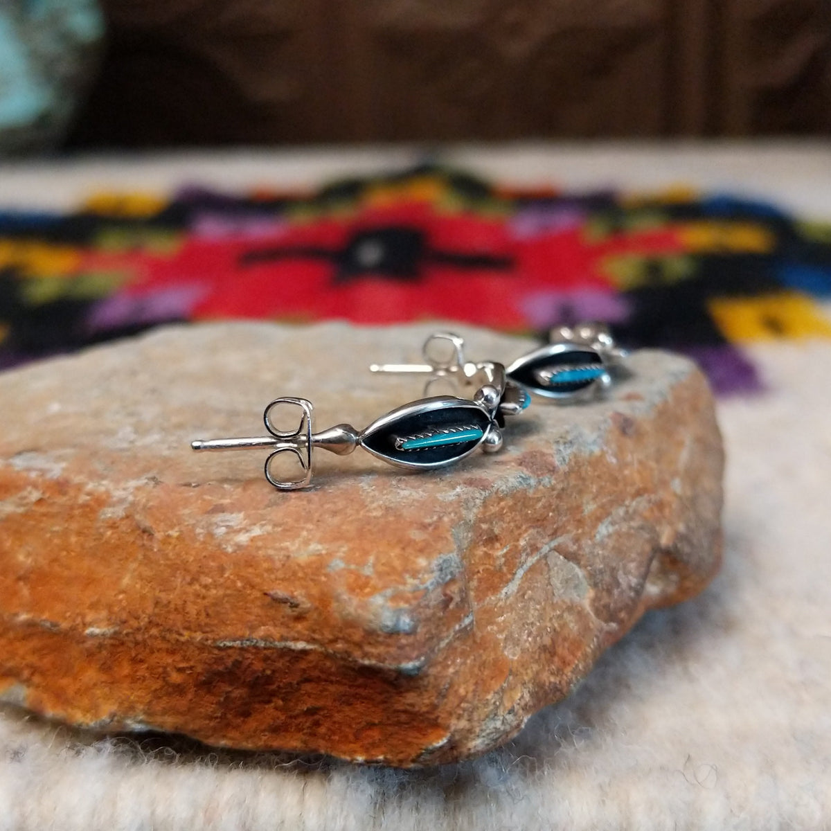 Zuni turquoise needlepoint hoop earrings by Fernando Othole.