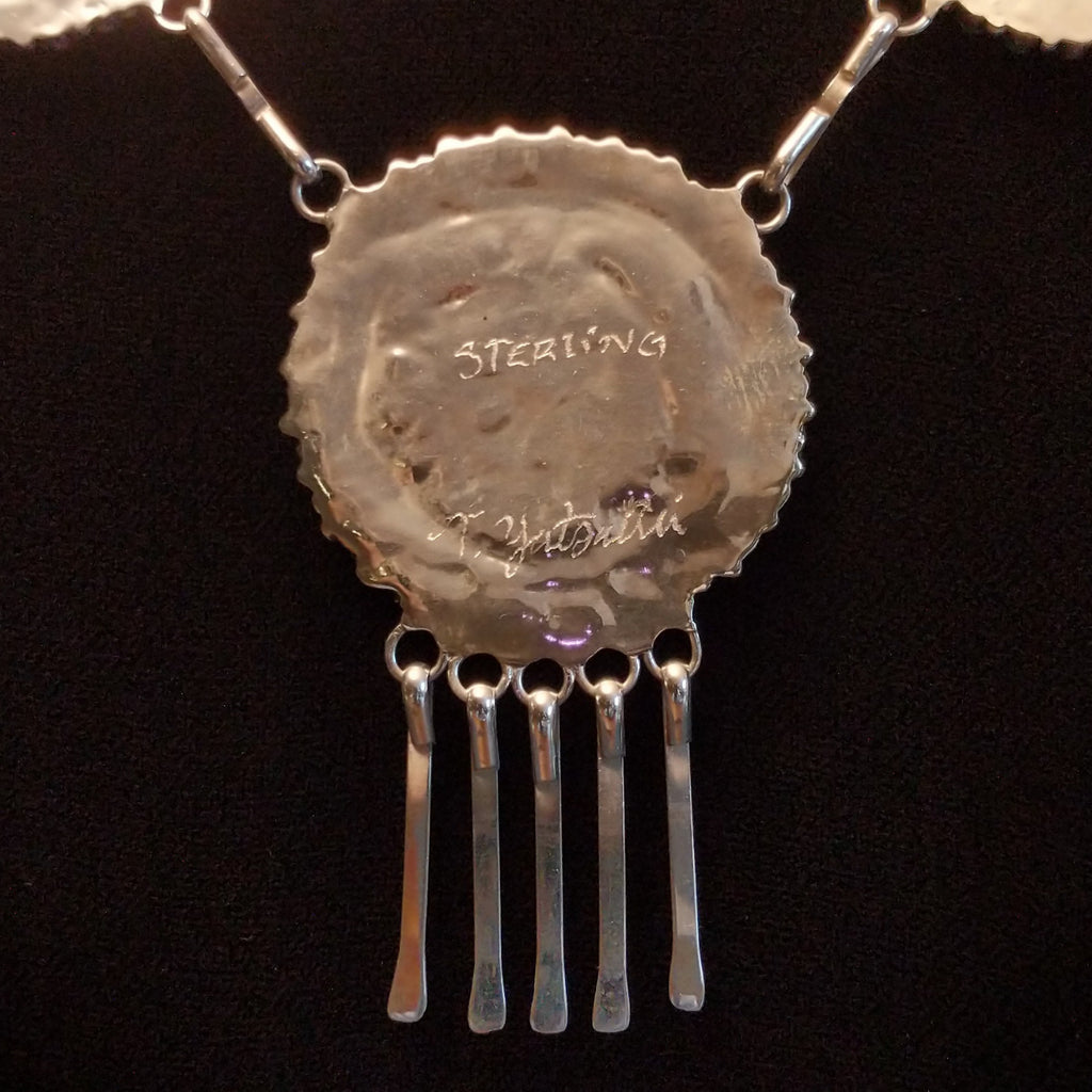 Close-up of the signature on the back.