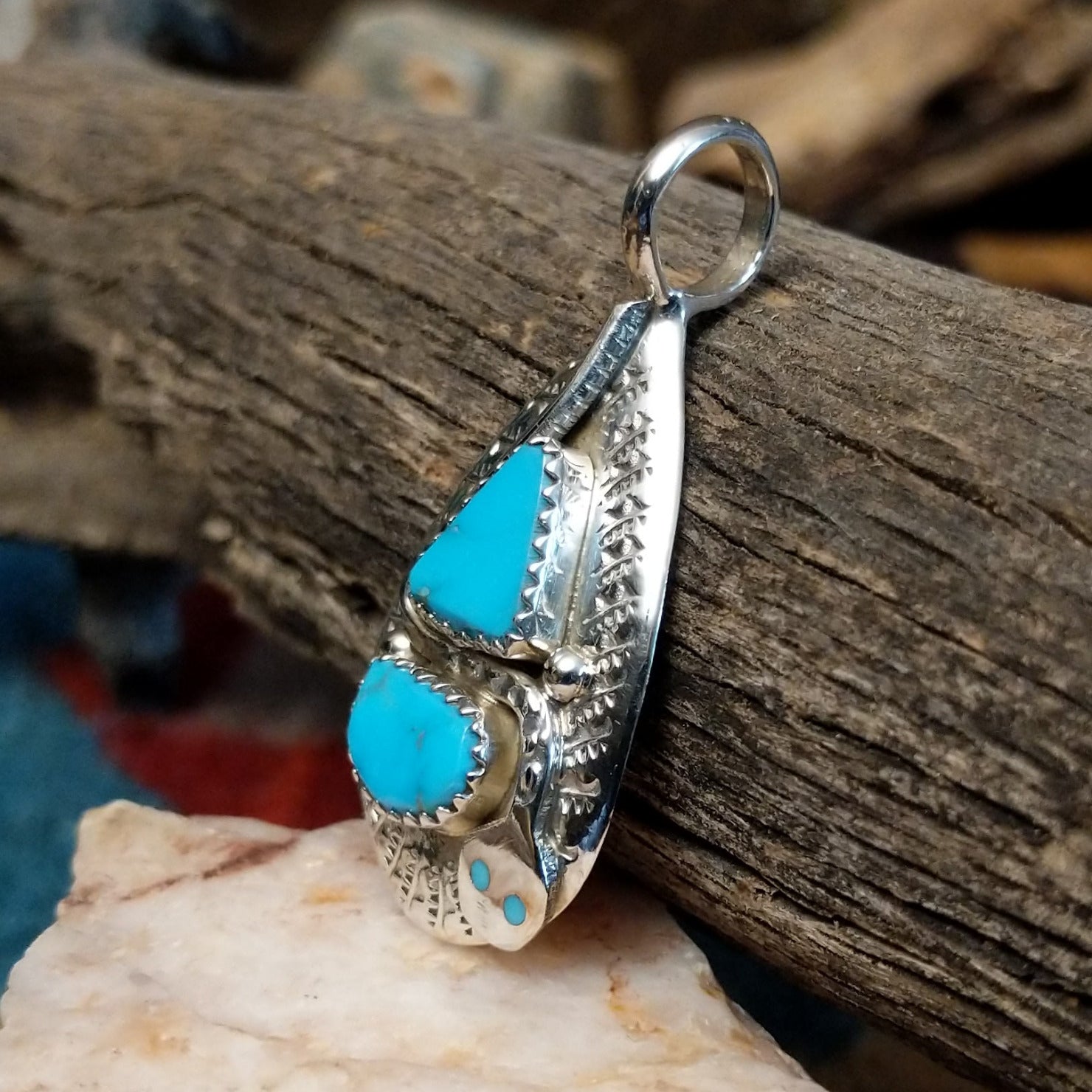 Zuni Turquoise Snake Pendant by Effie Calavaza GJ-PND-0255 – Arlene's