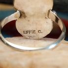 Close-up of the artisan's signature.