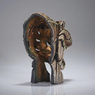 Back view of T-rex head sculpture