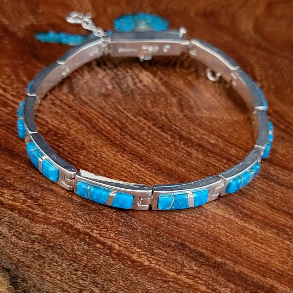navajo made turquoise inlay link bracelet front view