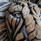 edge sculpture lion head close up front view